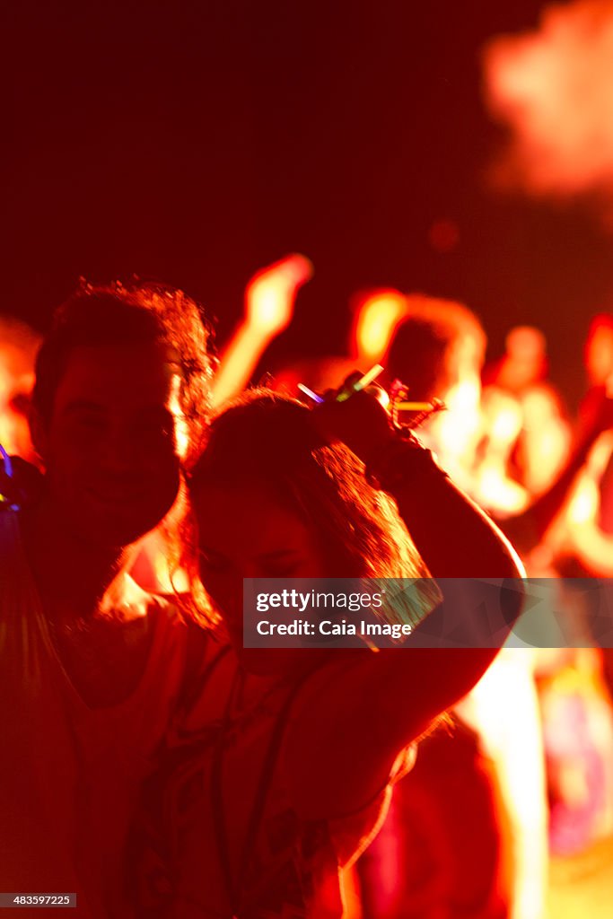 Couple dancing at music festival