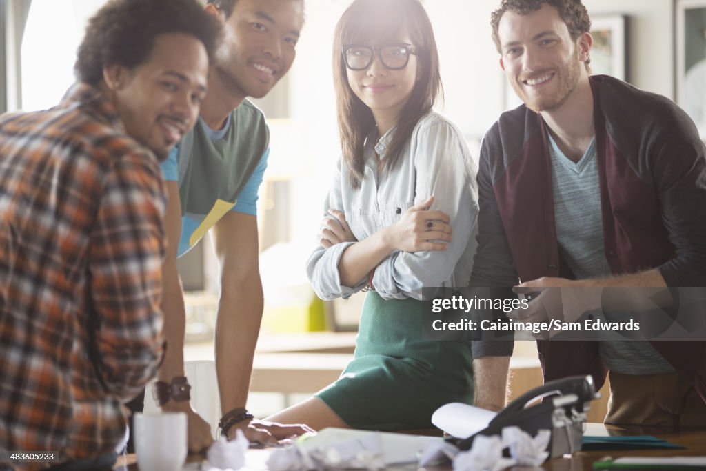 Portrait of creative business people in meeting at desk