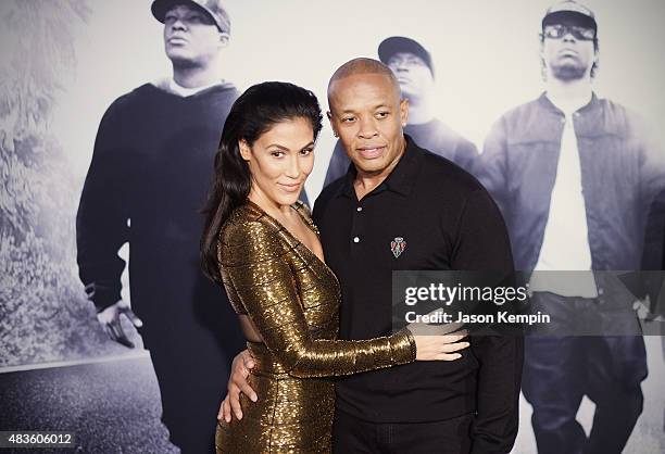 Dr. Dre and wife Nicole Young attend the premiere of "Straight Outta Compton" at Microsoft Theater on August 10, 2015 in Los Angeles, California.