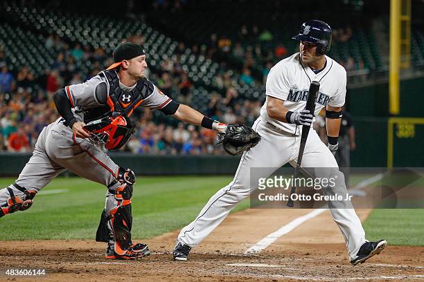 Jesus Montero of the Seattle Mariners is tagged out on a strikeout by catcher Caleb Joseph of the Baltimore Orioles for the final out in a 3-2 defeat...