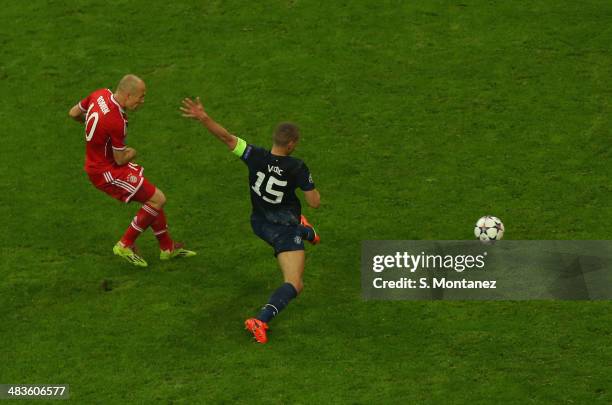 Arjen Robben of Bayern Munich scores his team's third goal during the UEFA Champions League quarter final second leg match between FC Bayern Muenchen...