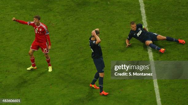 Thomas Mueller of Bayern Muenchen celebrates after scoring his team's second goal during the UEFA Champions League quarter final second leg match...