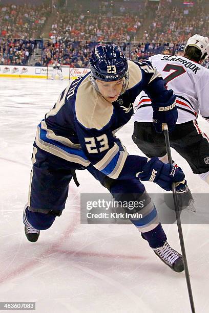 Matt Frattin of the Columbus Blue Jackets controls the puck during the game against the Chicago Blackhawks on April 4, 2014 at Nationwide Arena in...