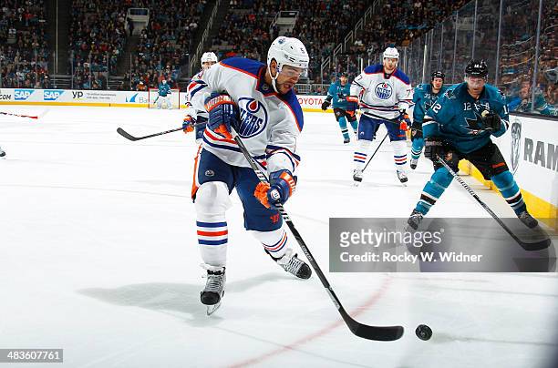 Mark Fraser of the Edmonton Oilers skates after the puck against the San Jose Sharks at SAP Center on April 1, 2014 in San Jose, California.