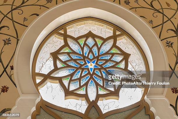 ornate stained glass window, sheikh zayed mosque, abu dhabi, united arab emirates - abu dhabi architecture stock pictures, royalty-free photos & images