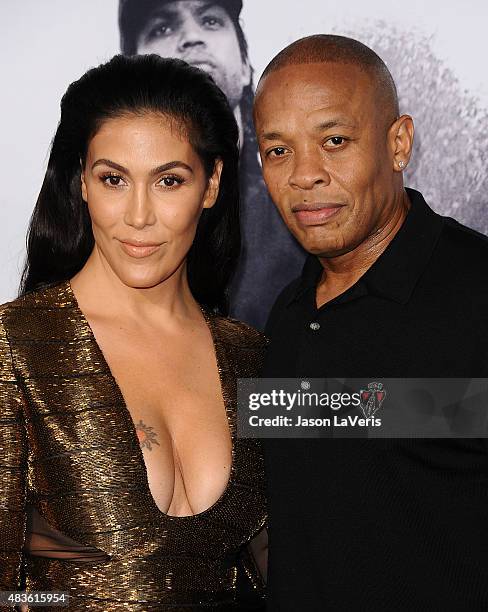 Dr. Dre and wife Nicole Young attend the premiere of "Straight Outta Compton" at Microsoft Theater on August 10, 2015 in Los Angeles, California.