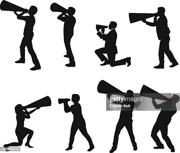 silhouette of people with bullhorns - legs apart stock illustrations