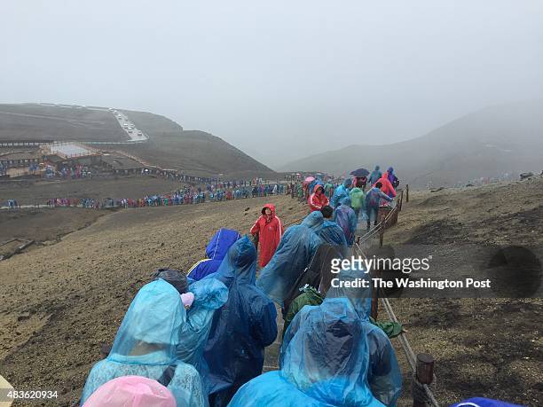 Hordes of tourists queue to go to the Lake of Heaven in the crater at the top of Changbaishan, a mountain on the Chinese border with North Korea. The...