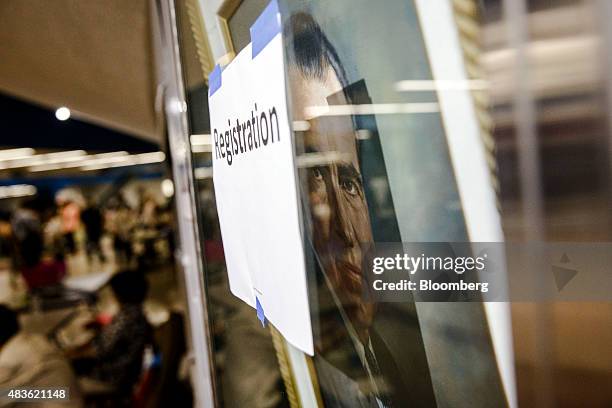 Registration sign covers a portrait of former President Richard Nixon during a campaign event for Democratic presidential candidate Bernie Sanders at...