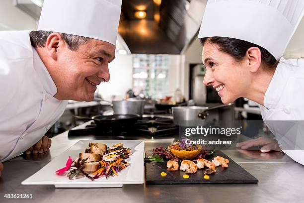 two chefs competing - cooking contest stock pictures, royalty-free photos & images