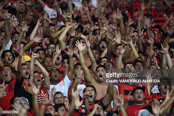 Fans of Brazil's Flamengo cheer before their Copa Libertadores football match against Mexico's Leon at the Mario Filho "Maracana" stadium in Rio de...