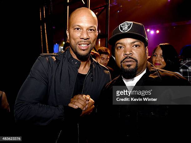 Hip-hop recording artist Common and rapper Ice Cube pose at the after party for the premiere of Universal Pictures and Legendary Pictures' "Straight...