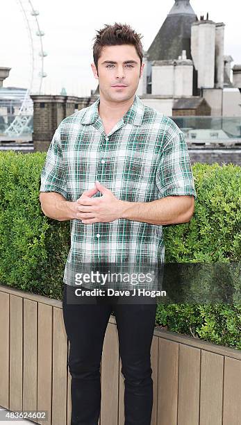 Zac Efron poses at the "We Are Your Friends" photocall at the Corinthia Hotel London on August 11, 2015 in London, England.