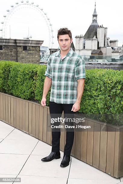 Zac Efron poses at the "We Are Your Friends" photocall at the Corinthia Hotel London on August 11, 2015 in London, England.