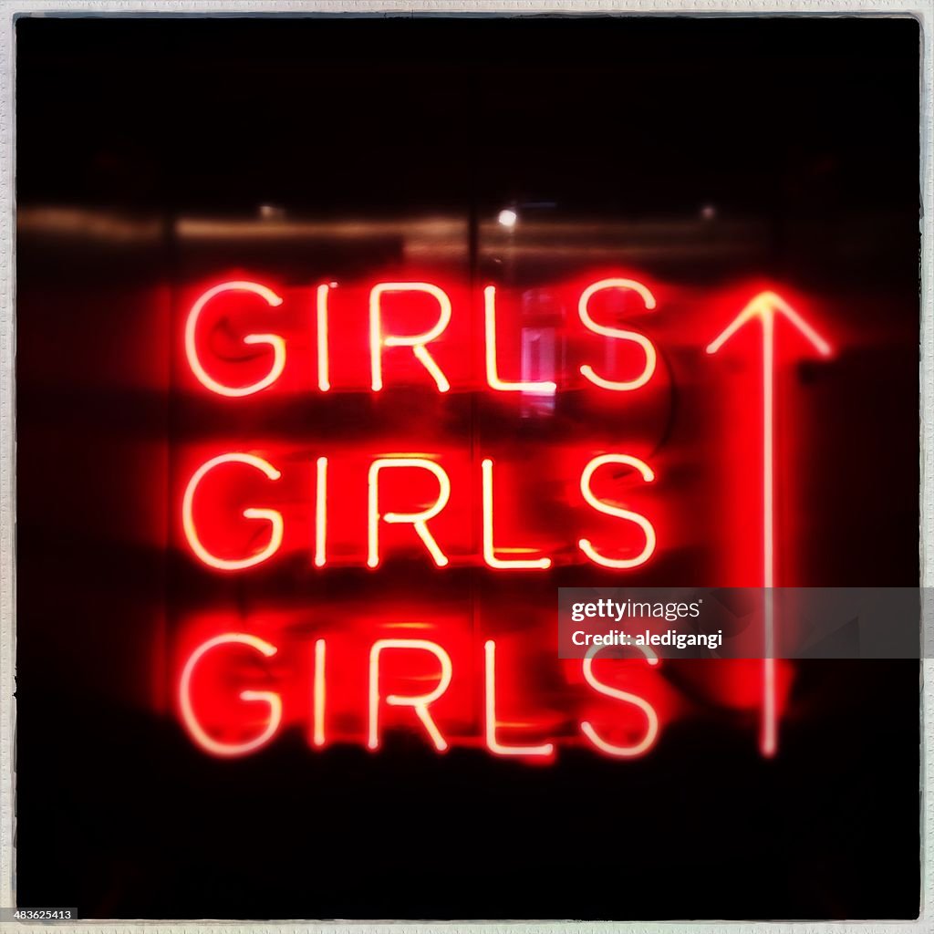 Netherlands, North Holland, Amsterdam, Orange neon 'girls'