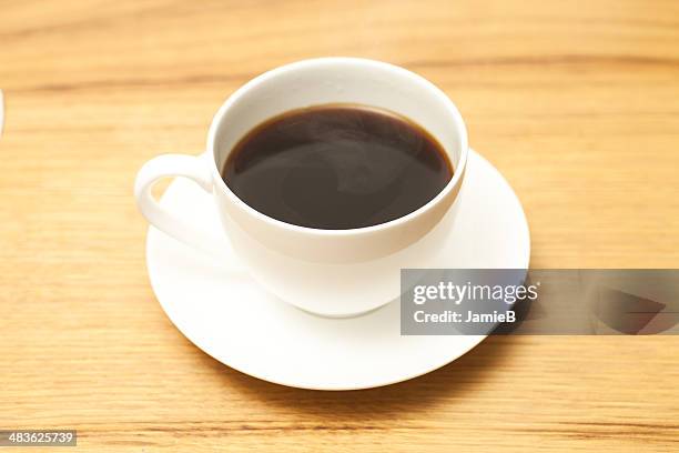 cup of americano coffee - americano stockfoto's en -beelden