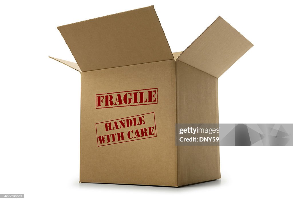 Box labeled fragile and handle with care on white background