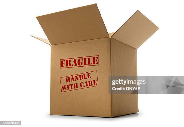 box labeled fragile and handle with care on white background - fragile sign stock pictures, royalty-free photos & images