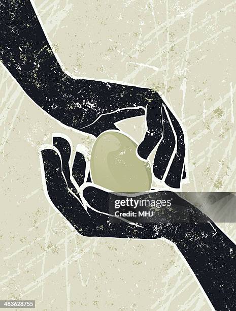 hand's cradling an egg - clasped hands stock illustrations