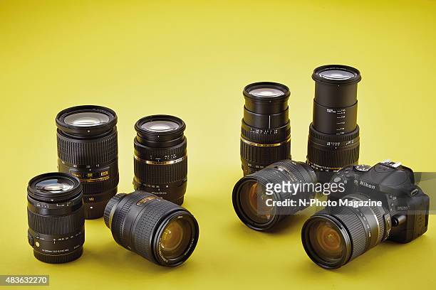 Nikon D5200 DSLR camera with a selection of DX superzoom lenses, taken on July 29, 2014.