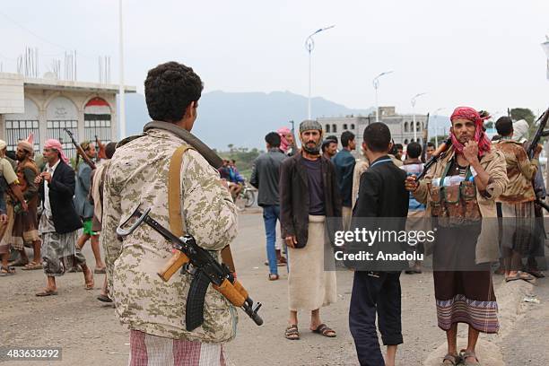 Members of Yemeni Popular Resistance Forces loyal to president-in-exile Abd Rabbuh Mansour Hadi celebrate after capturing some three district of Ibb...