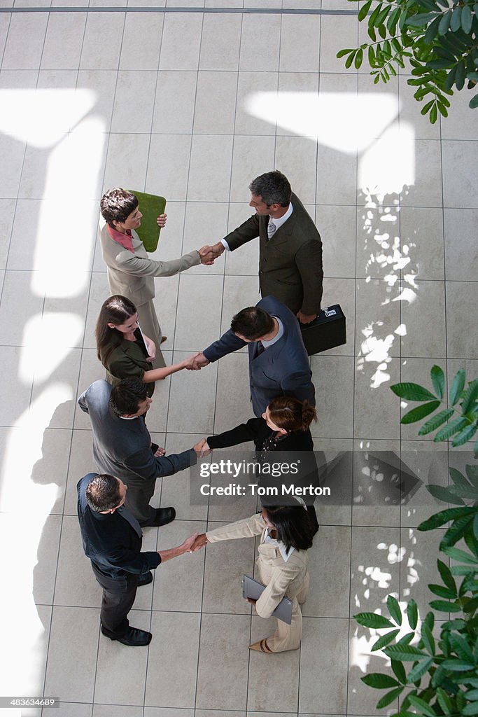 Close-up of business people shaking hands
