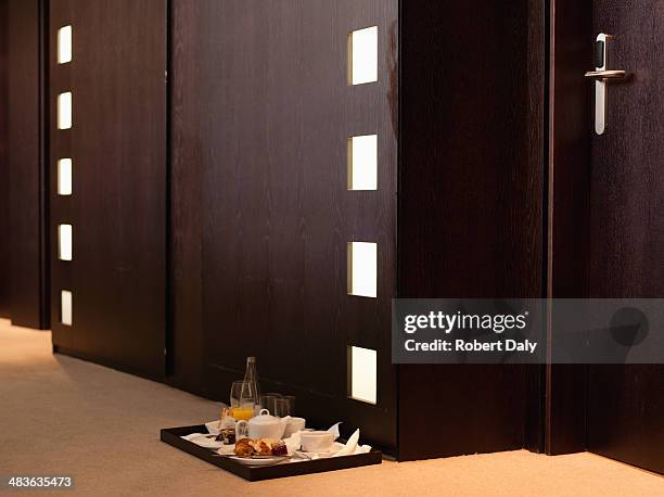 hallway with room service tray in hotel - hotel kiosk stock pictures, royalty-free photos & images