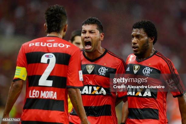 Andre Santos Leo Moura and Amaral of Flamengo celebrates a scored goal of Andre Santos during a match between Flamengo and Leon as part of Copa...