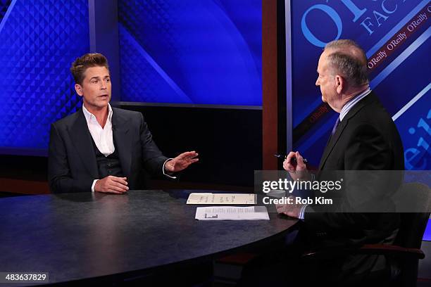 Rob Lowe talks to host Bill O'Reilly at Fox News' "The O'Reilly Factor" at Fox News Studios on April 9, 2014 in New York City.