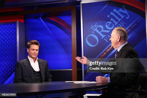 Rob Lowe talks to host Bill O'Reilly at Fox News' "The O'Reilly Factor" at Fox News Studios on April 9, 2014 in New York City.