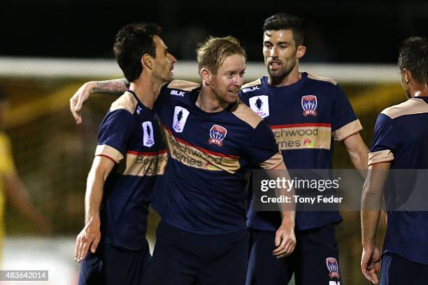 David Carney and Labinot Haliti of the Jets celebrate a goal during the FFA Cup match between Newcastle Jets and Perth Glory at Magic Park,...