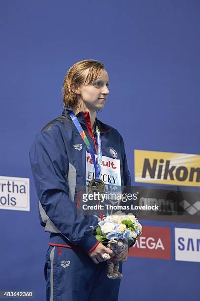 16th FINA World Championships: USA Katie Ledecky on medal stand after winning Women's 200M Freestyle Final at Kazan Arena. Ledecky won gold. Kazan,...