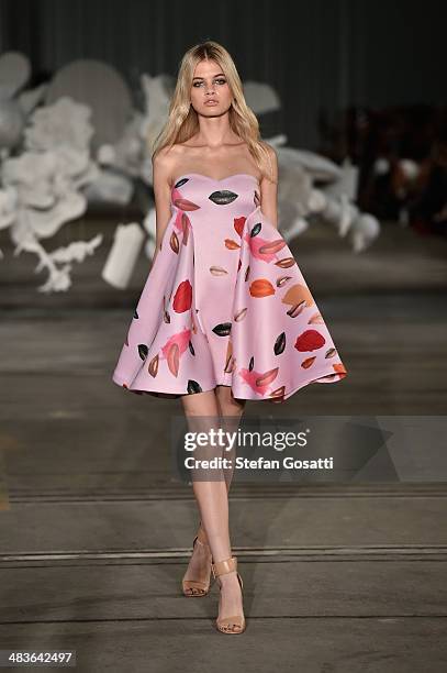 Model walks the runway at the Alice McCall show during Mercedes-Benz Fashion Week Australia 2014 at Bay 25, Carriageworks on April 10, 2014 in...