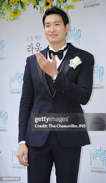 Jung Gyu-Woon poses for photographs before the wedding at The Raum on April 5, 2014 in Seoul, South Korea.