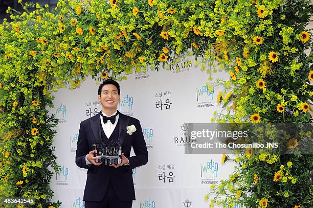 Jung Gyu-Woon poses for photographs before the wedding at The Raum on April 5, 2014 in Seoul, South Korea.