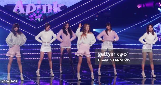 This photo taken on April 9, 2014 shows South Korean KPOP idol band "A-Pink" performing in the music variety program "MBC Show Champion" in Seoul....