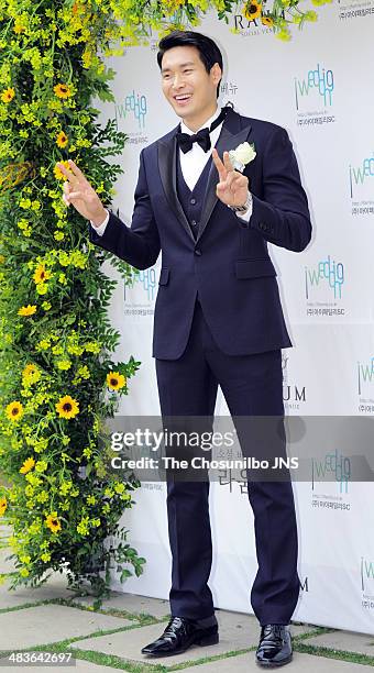 Jung Gyu-Woon poses for photographs before the wedding at The Raum on April 5, 2014 in Seoul, South Korea.