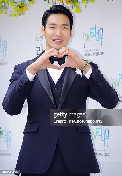 Jung Gyu-Woon poses for photographs before the wedding at The Raum on April 5, 2014 in Seoul, South Korea.