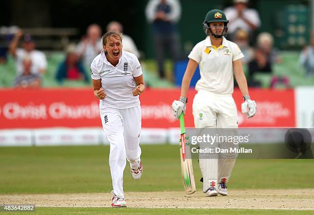 Laura Marsh of England celebrates taking the wicket of Alyssa Healy of Australia during day one of the Kia Women's Test of the Women's Ashes Series...