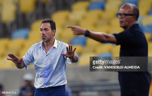 Mexico's Leon's coach Gustavo Cristian Matosas and Brazlian Flamengo's coach Jaime de Almeida, gesture during the Libertadores Cup football match at...