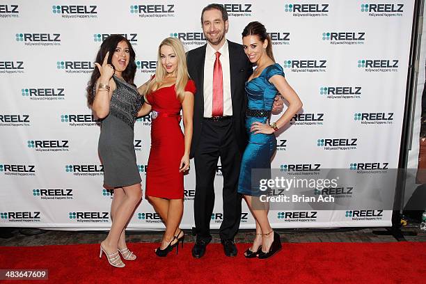 Dominique Pinassi, Aria Johnson, and Cory Oliver of Beverly Hills Pawn pose with Senior Vice President of Advertising Sales at Reelz Bill Rosolie at...