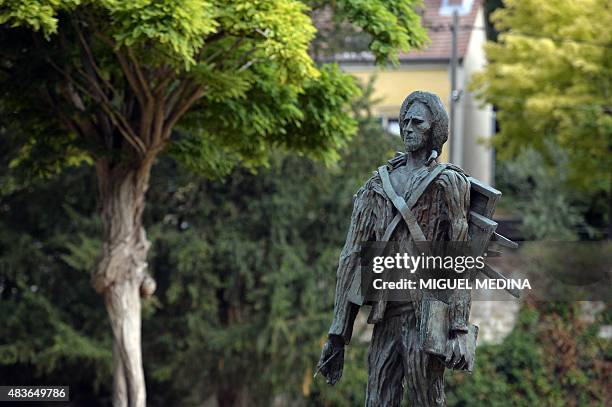 Sculpture depicting Dutch painter Vincent Van Gogh by Ossip Zadkine stands in Auvers-sur-Oise in the northwestern suburbs of Paris on August 11,...