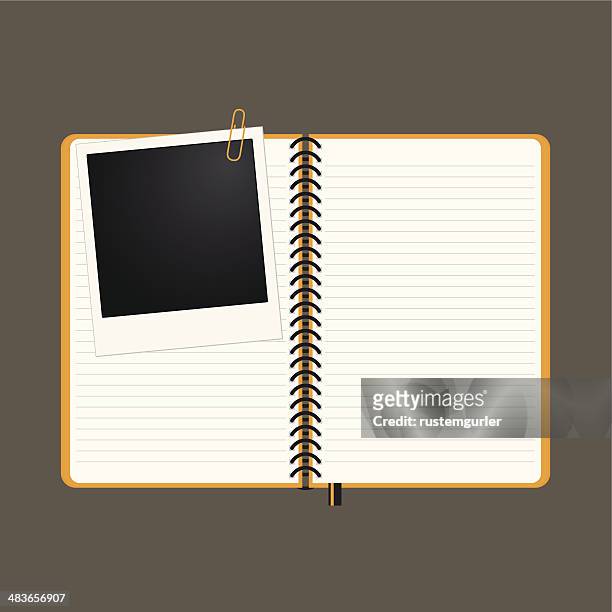 note book and photo frame - single object photos stock illustrations