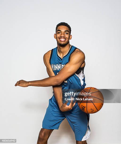 Karl-Anthony Towns of the Minnesota Timberwolves poses for a portrait during the 2015 NBA rookie photo shoot on August 8, 2015 at the Madison Square...