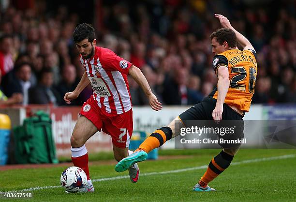 Piero Mingoia of Accrington Stanley in action with Andy Robertson of Hull City during the Capital One Cup First Round match between Accrington...