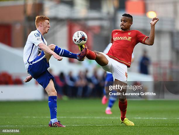 Michael Mancienne of Nottingam Forest battles with Reece Flanagan of Walsall during the Capital One Cup First Round match between Nottingham Forest...