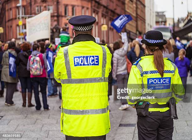 police officers at a peaceful demonstration - nottingham uk stock pictures, royalty-free photos & images