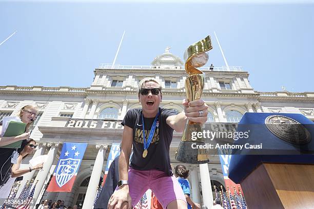 World Cup Championship Ceremony: Megan Rapinoe victorious with FIFA World Cup Trophy during Victory Ceremony at City Hall. New York, NY 7/10/2015...