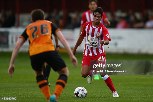 Gerardo Bruna of Accrington Stanley attempts to move past Andy Robertson of Hull City during the Capital One Cup First Round match between Accrington...