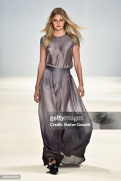Model walks the runway in a design by Caslazur at the New Generation show during Mercedes-Benz Fashion Week Australia 2014 at Carriageworks on April...